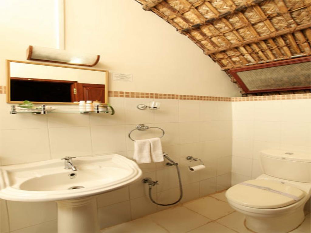 Marvel Cruise Hotell Alappuzha Rum bild
